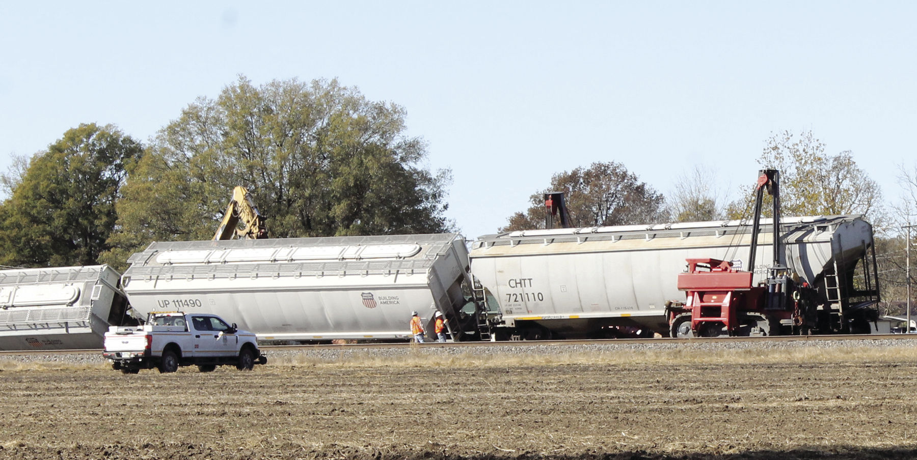 Strong winds topple train cars